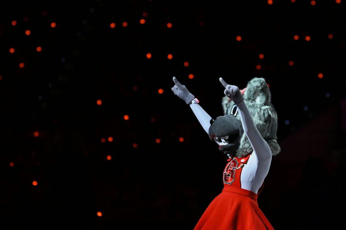 Ms.Wuf hypes up the crowd during the game against UNC-Chapel Hill on Saturday, Jan. 11, 2025, at Lenovo Center. The Lenovo Center gave all attendees synchronized light-up wristbands. The Tar Heels defeated the Wolfpack 63-61.