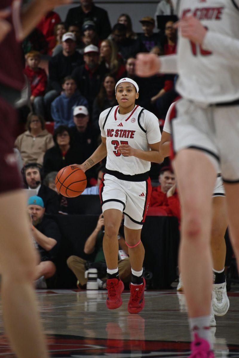 Sophomore guard Zoe brooks drives the ball during the match against Virginia Tech in Reynolds Coliseum on Sunday, Jan. 26, 2025. Brooks had eight rebounds and scored 12 points. The Wolfpack beat the Hokies 85-57.