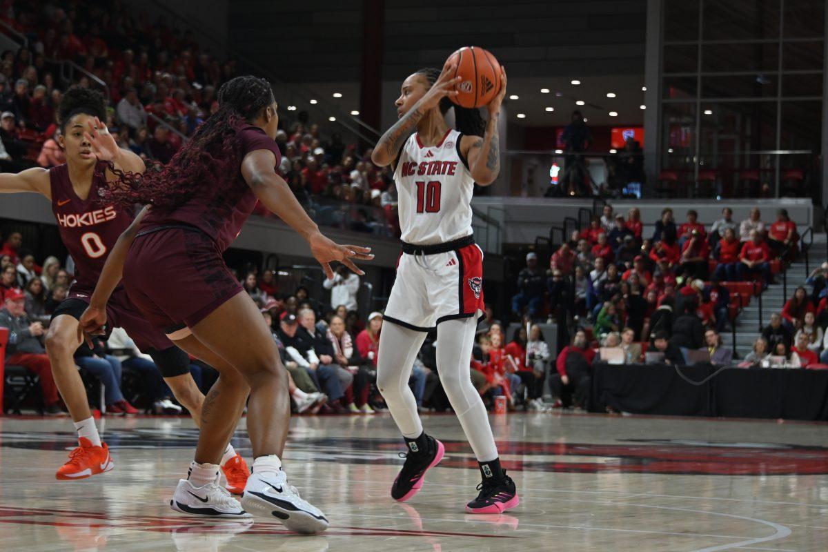 Senior guard Aziaha James defends the ball during the match against Virginia Tech in Reynolds Coliseum on Sunday, Jan. 26, 2025. James had five rebounds and scored 25 points. The Wolfpack beat the Hokies 85-57.