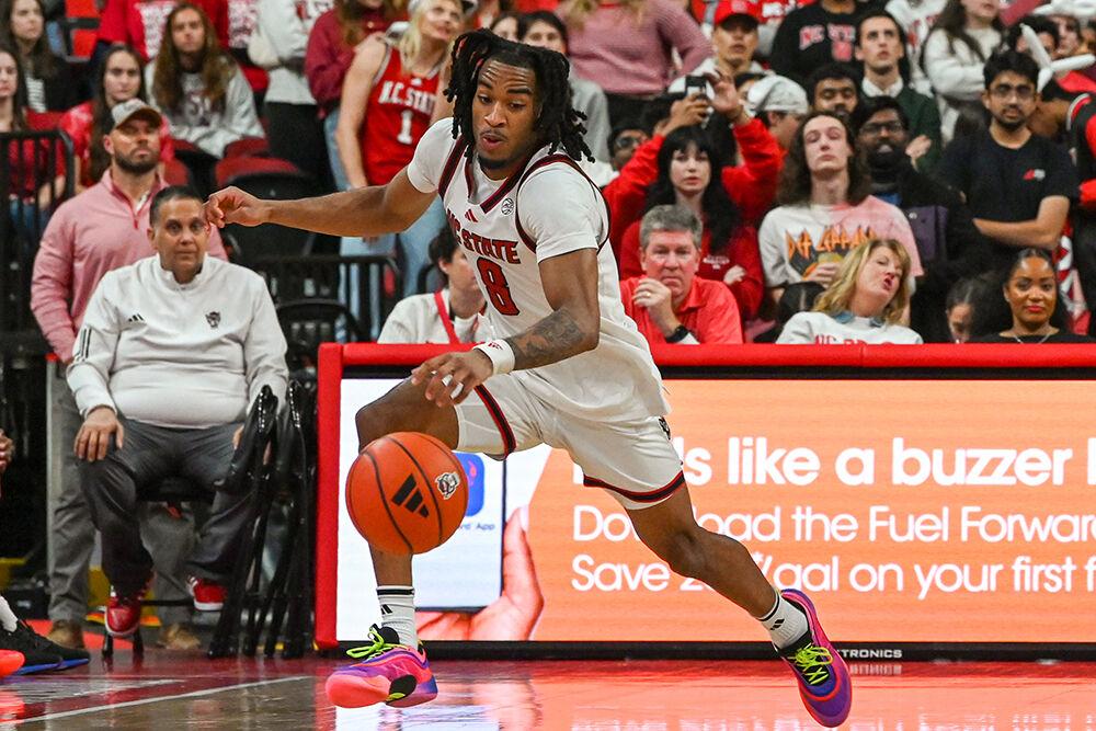 Senior guard Jayden Taylor goes after a loose ball during the game against California at the Lenovo Center on Saturday, Jan. 18, 2025. Taylor had two steals. NC State lost the game 65-62.