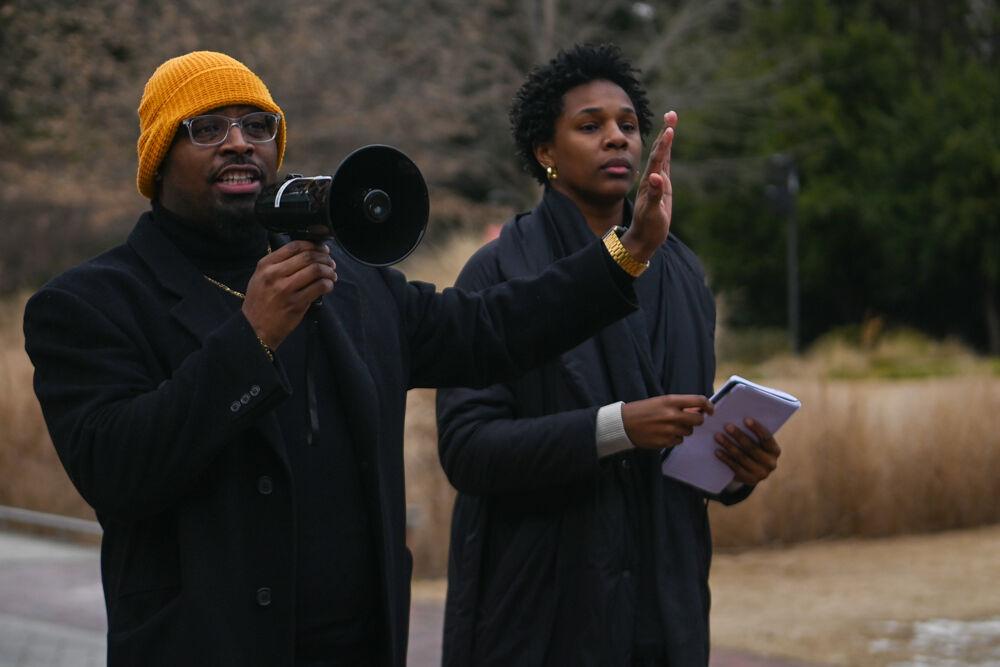Quashon Bunch, associate director of the African American Cultural Center, speaks into a megaphone during March Like Martin from Stafford Commons to Harris Field on Friday, Jan. 24, 2025. This year marks the fourth annual March Like Martin event.