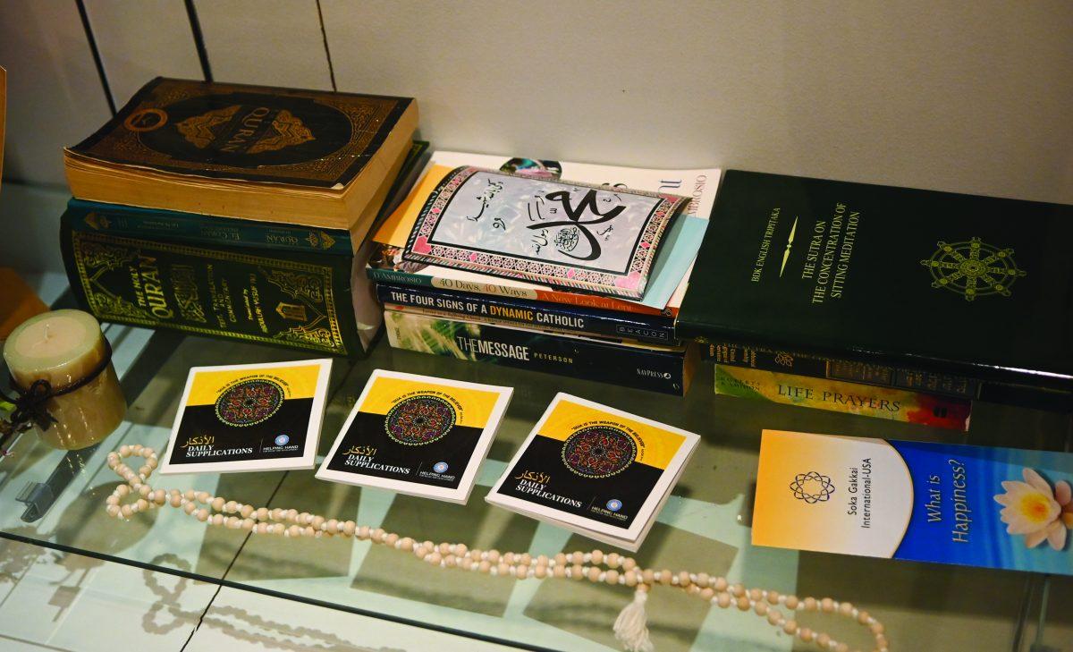 Religious texts and pamphlets sit on a shelf in the Cultural Hearth inside of Talley Student Union on Tuesday, Jan. 21, 2025. The space is an area for students, faculty and staff to pray or meditate.
