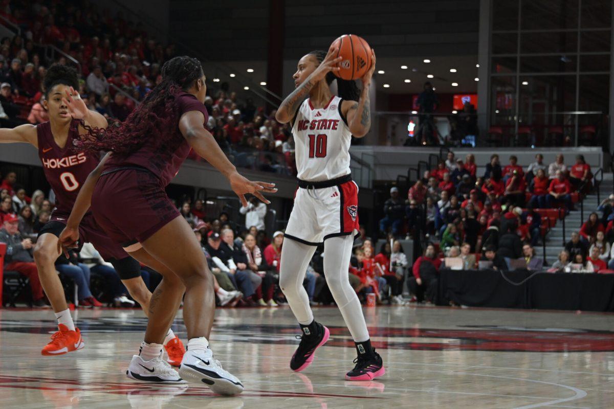 Senior guard Aziaha James defends the ball during the match against Virginia Tech in Reynolds Coliseum on Sunday, Jan. 26, 2025. James had five rebounds and scored 25 points. The Wolfpack beat the Hokies 85-57.