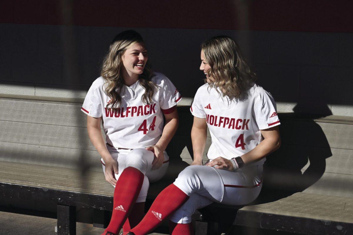 Sophomore outfielder Tori Ensley (left), and senior infielder Taylor Ensley (right) laugh at an inside joke in Dail Softball Stadium on Friday, Jan. 17, 2025. When reflecting on their time together as sisters on the NC State softball team, Tori stated &#8220;I don&#8217;t know anyone who loves me as much as Taylor does&#8221;.