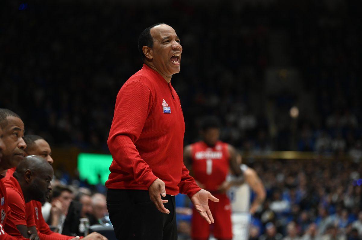 Head coach Kevin Keatts communicates with NC State players on the court during the Wolfpack's game against the Duke Blue Devils in Cameron Indoor on Monday, Jan. 27, 2025. The Blue Devils beat the Wolfpack 74-64.