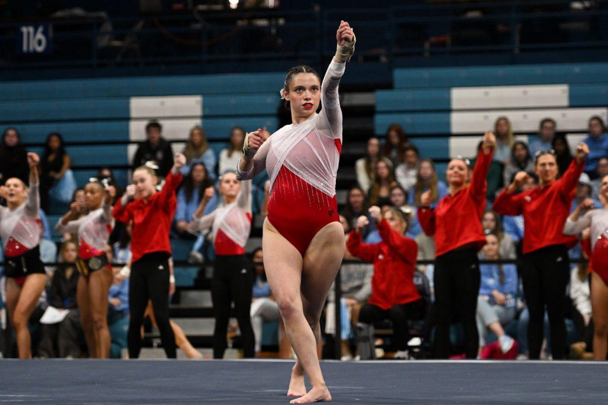 Graduate student Chloe Negrete poses during her floor routine during the meet against UNC-Chapel Hill in Carmichael Arena on Friday, Jan. 24, 2025. Negrete earned a 9.925 on her floor routine. The Wolfpack beat the Tar Heels 196.350-195.925.