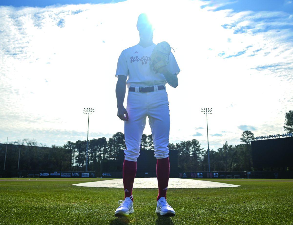 Sophomore pitcher Jacob Dudan stands in front of the pitcher&#8217;s mound at Doak Field at Dail Park on Friday, Jan. 24, 2025. In 2024, Dudan made 27 appearances on the mound, the most of any pitcher on the team.