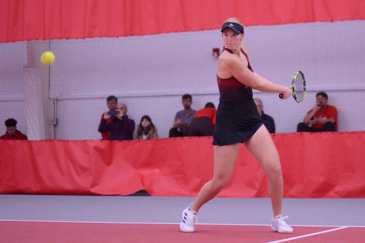 Sophomore Maddy Zampardo looks to backhand the ball during the match against Pepperdine at J.W. Isenhour Tennis Center on Saturday, Jan. 19, 2025. Zampardo won her singles match 2-1. NC State defeated Pepperdine 5-2.