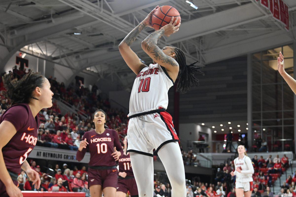 Senior guard Aziaha James shoots the ball during the match against Virginia Tech in Reynolds Coliseum on Sunday, Jan. 26, 2025. James had five rebounds and scored 25 points. The Wolfpack beat the Hokies 85-57.