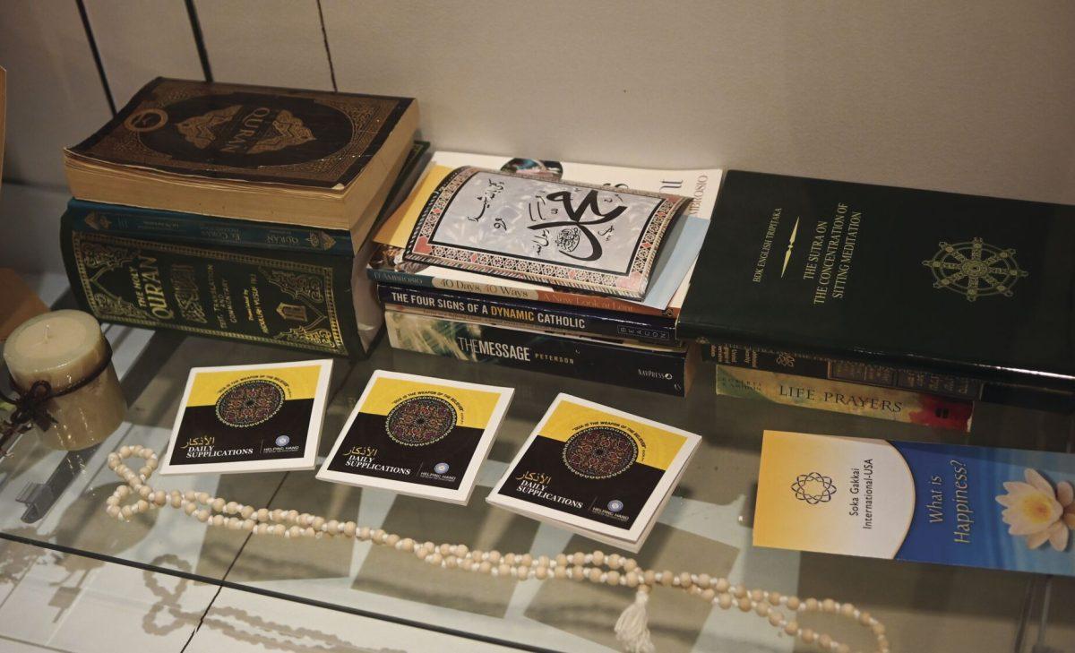 Religious texts and pamphlets sit on a shelf in the Cultural Hearth inside of Talley Student Union on Tuesday, Jan. 21, 2025. The space is an area for students, faculty and staff to pray or meditate.