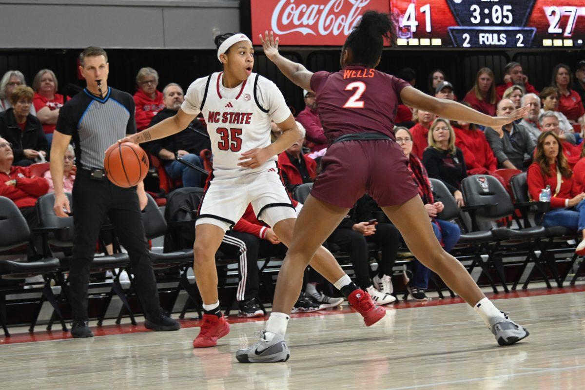Sophomore guard Zoe brooks defends the ball during the match against Virginia Tech in Reynolds Coliseum on Sunday, Jan. 26, 2025. Brooks had eight rebounds and scored 12 points. The Wolfpack beat the Hokies 85-57.