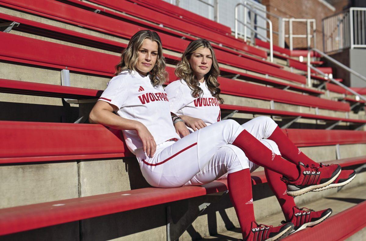 Sophomore outfielder Tori Ensley (left), and senior infielder Taylor Ensley (right) pose for a photo in Dail Softball Stadium on Friday, Jan. 17, 2025. The sisters on the NC State softball team have made a name for themselves, finishing in the top five in batting average last season.