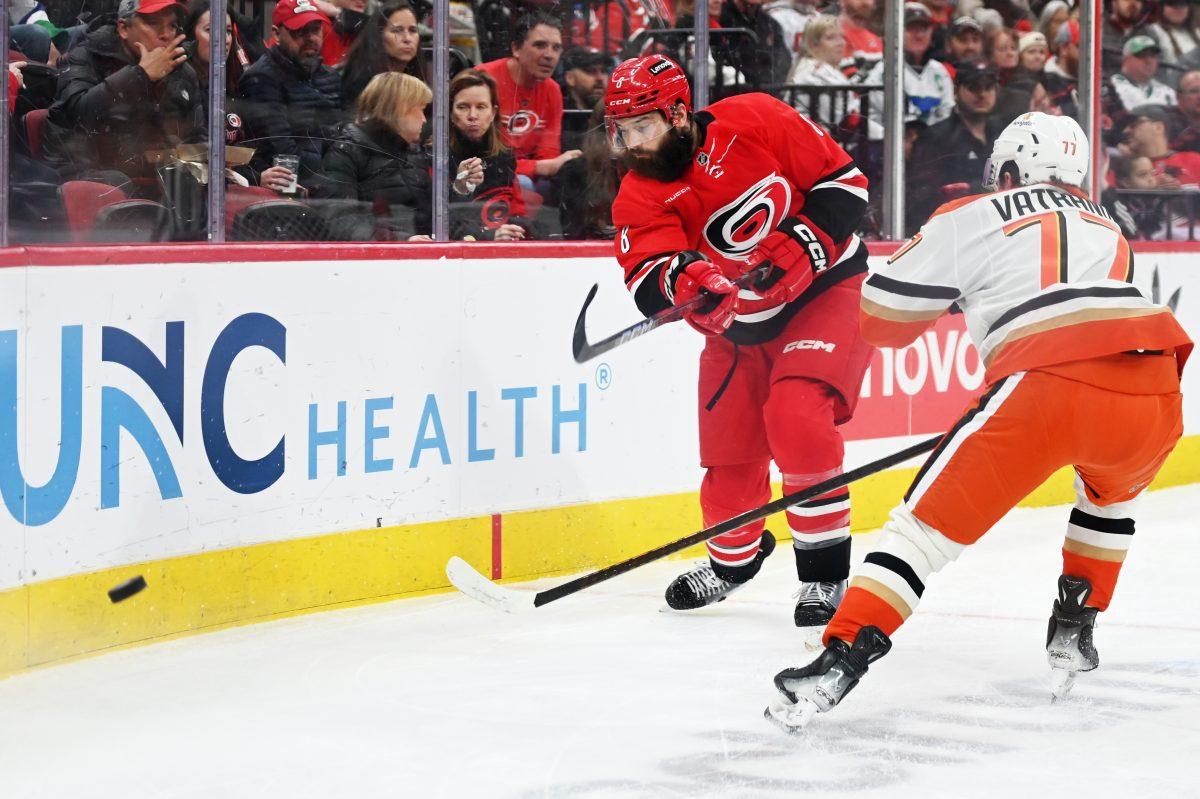Defenseman Brent Burns passes the puck during the game versus the Anaheim Ducks at Lenovo Center on Sunday, Dec 12, 2024. The Ducks beat the Hurricanes 3-2 in overtime.