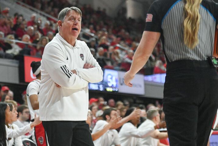 Head coach Wes Moore argues with a referee during the match against Pitt in Reynolds Coliseum on Thursday, Jan. 16, 2025. Moore has completed 11 seasons as NC State&#8217;s head coach. The Wolfpack beat the Panthers 83-67.