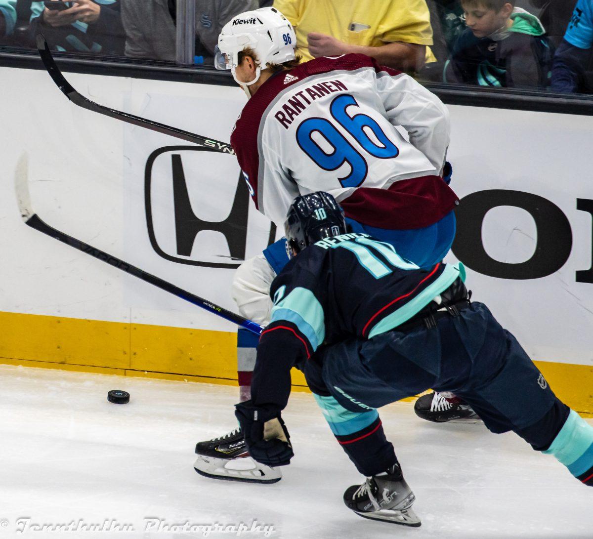 "Colorado Avalanche at Seattle Kraken - 2023-04-24 - Round 1 Game 4 - Matty Beniers and Mikko Rantanen (52846249512)" by Jenn G from Seattle, WA is licensed under CC BY-SA 2.0. To view a copy of this license, visit https://creativecommons.org/licenses/by-sa/2.0/?ref=openverse.