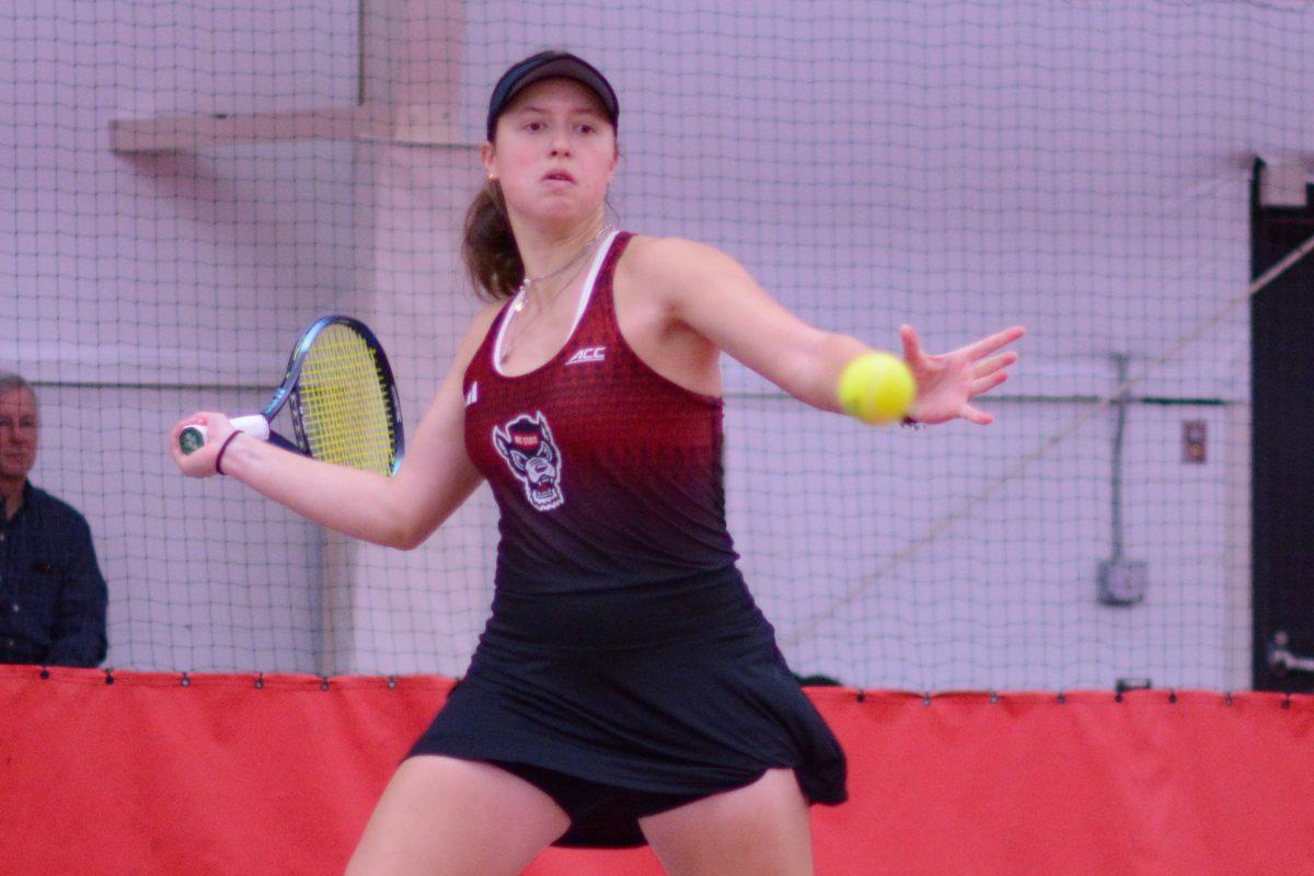 Junior Anna Zyryanova winds up to forehand the ball during the match against Pepperdine at J.W. Isenhour Tennis Center on Saturday, Jan. 19, 2025. Zyryanova won her singles match 2-0. NC State defeated Pepperdine 5-2.