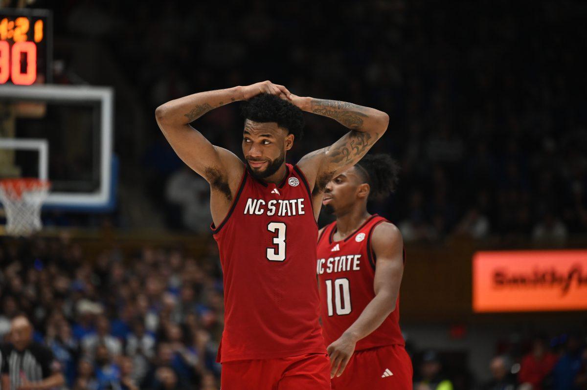 Senior guard/forward Dontrez Styles puts his hands on his head as he heads to the bench after fouling out during the Wolfpack's game against the Duke Blue Devils in Cameron Indoor on Monday, Jan. 27, 2025. The Blue Devils beat the Wolfpack 74-64.