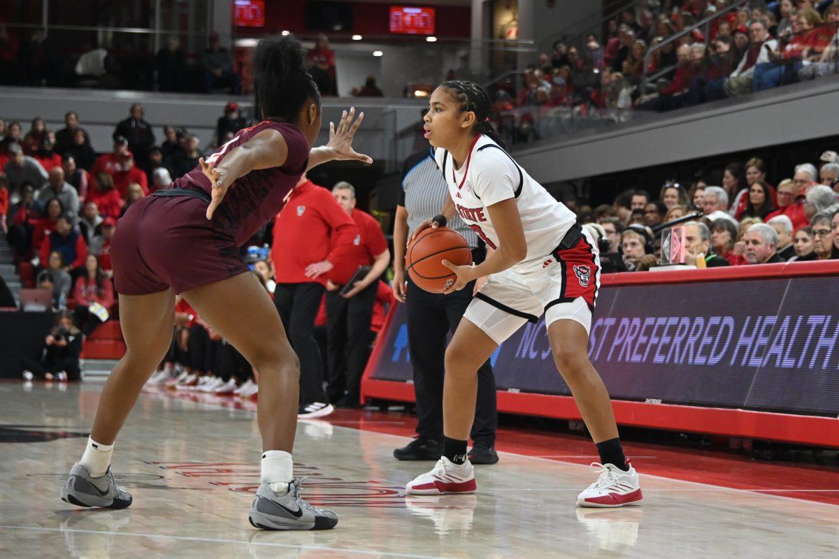Freshman guard Zamareya Jones defends the ball during the match against Virginia Tech in Reynolds Coliseum on Sunday, Jan. 26, 2025. Jones had three rebounds and scored seven points. The Wolfpack beat the Hokies 85-57.