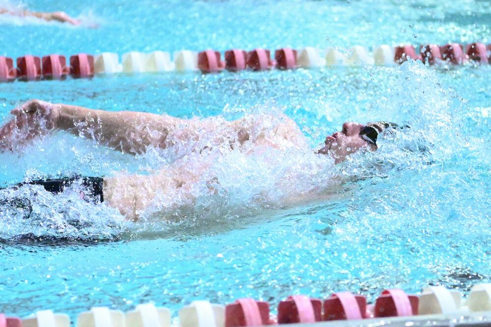 Junior Stephen Conrad competes in the men's 100 backstroke finals&#8204; during the swim and dive meet against UNC-Chapel Hill in the Casey Aquatic Center on Friday, Jan. 17, 2025. Conrad placed seventh in the men's 100 back. NC State beat UNC 165-134.