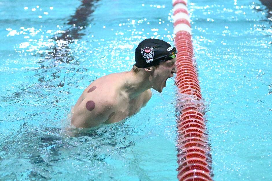 Junior Ryan Weaver celebrates his success during the swim and dive meet against UNC-Chapel Hill in the Casey Aquatic Center on Friday, Jan. 17, 2025. Weaver placed third in the men's 200 back. NC State beat UNC 165-134.
