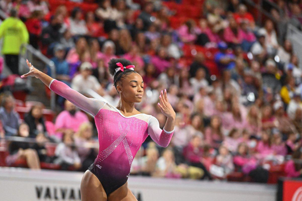 Sophomore Ashley Knight poses on the balance beam during the meet against Pittsburgh at Reynolds Coliseum on Saturday, Feb. 8, 2025. Knight recorded a 9.700 on the balance beam. NC State beat Pittsburgh 196.475-193.600.