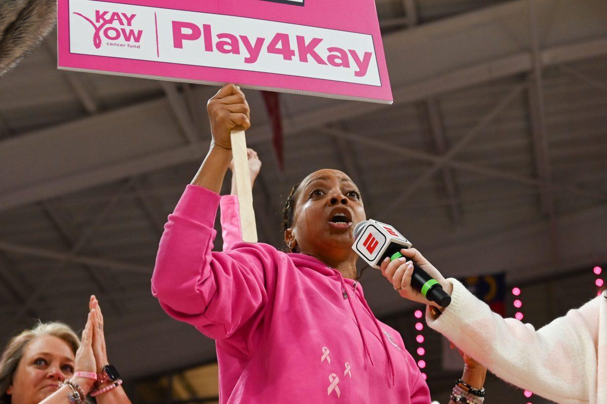 A breast cancer survivor gives a tearful speech during the Play4Kay game against Duke in Reynolds Coliseum on Feb. 3, 2025. The game commemorates Kay Yow, former NC State women's basketball coach who died of breast cancer in 2009.
