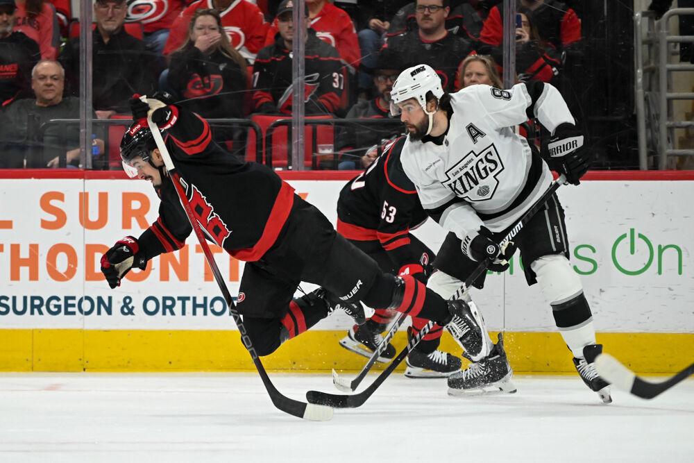 Forward Seth Jarvis trips over the opponents stick during the game against the Los Angeles Kings at the Lenovo Center on Saturday, Feb. 1, 2025. The Hurricanes fell to the Kings 4-2.