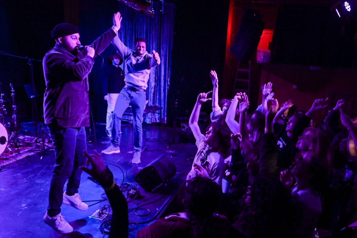 Sk the Novelist jumps with the crowd during the second night of WKNC's Double Barrel Benefit at Kings in Downtown Raleigh on Saturday, Feb. 15, 2025. Sk the Novelist is a rapper from North Carolina and is a WKNC and NC State Alum.