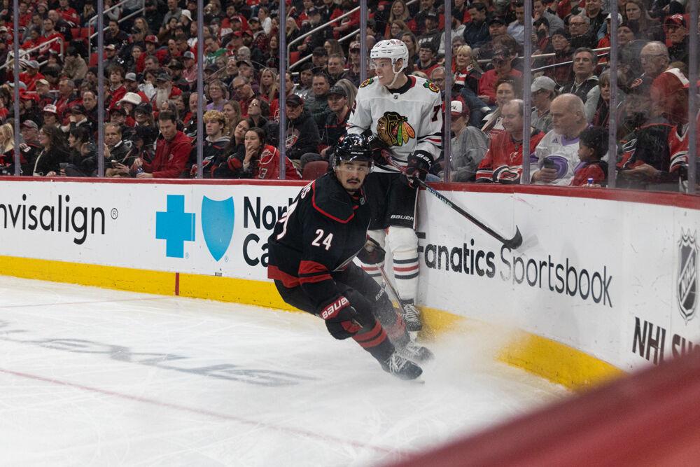 Center Seth Jarvis cuts in front of a defender during the game versus the Chicago Blackhawks at the Lenovo Center on Thursday, Jan 30, 2025. The Hurricanes beat the Blackhawks 3-2.