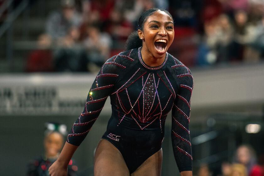 Freshman Syniya Thomas shouts during the meet against California in Reynolds Coliseum on Sunday, Feb. 2, 2025. Thomas scored 9.875 points in the floor routine. The Wolfpack lost to the Bears 197.175-196.550