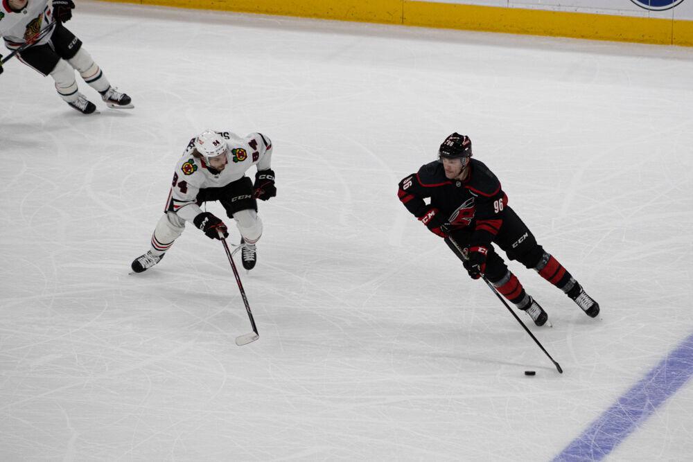Right Wing Mikko Rantanen skates around a defender during the game versus the Chicago Blackhawks at the Lenovo Center on Thursday, Jan 30, 2025. Rantanen had one goal during the game. The Hurricanes beat the Blackhawks 3-2.