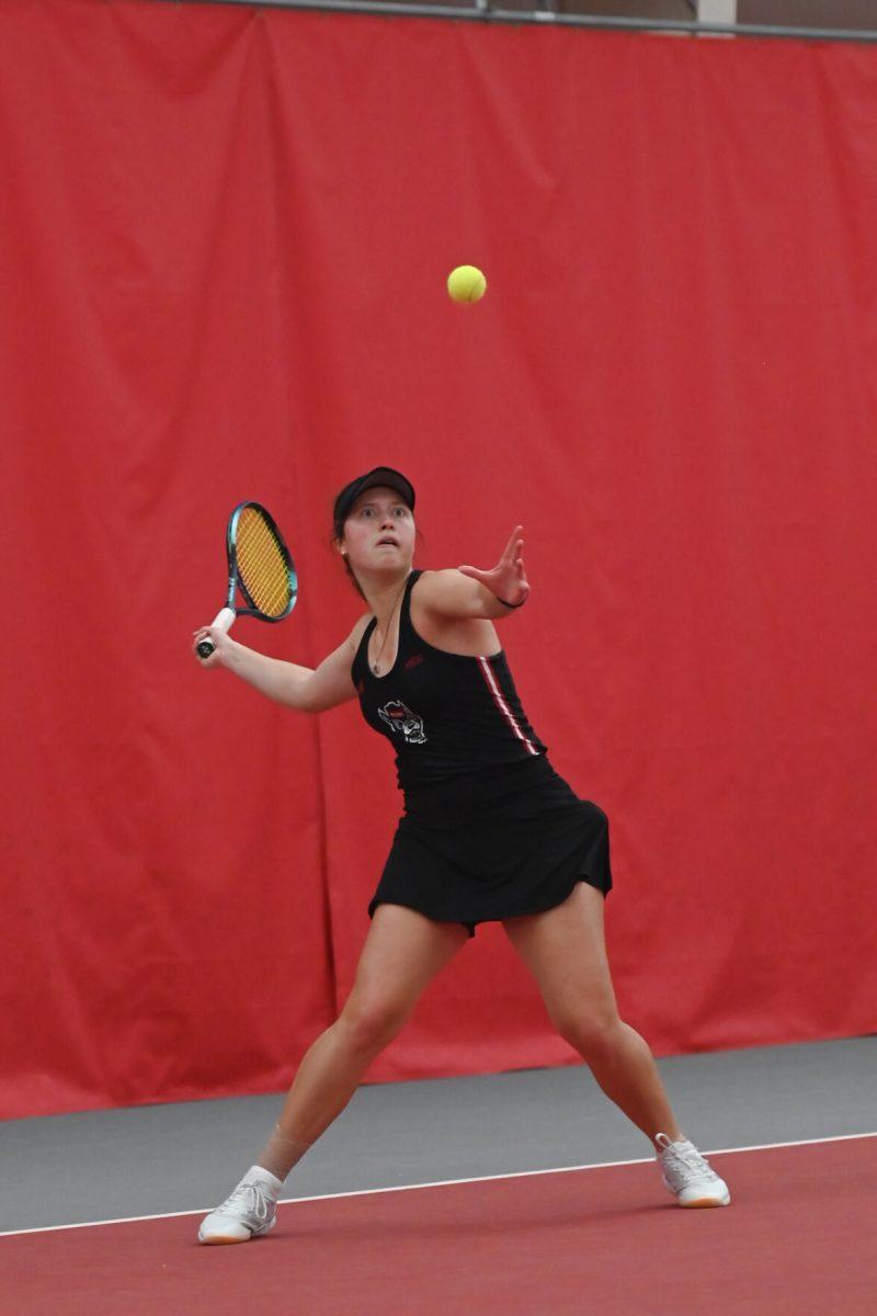 Junior Anna Zyryanova returns the ball during the match against Michigan at J. W. Isenhour Tennis Center on Friday, Feb. 14, 2025. Zyryanova lost her singles match 2-1. NC State beat Michigan 5-2.