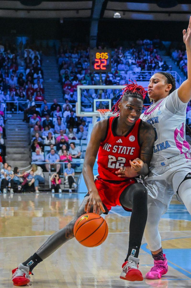 Senior guard&#160;Saniya Rivers drives for the basket during the game against UNC-Chapel Hill in Carmichael Arena on Sunday, Feb. 16, 2025. Rivers&#160;set a season high with 40 minutes on the court. In Carmichael Arena on Sunday, Feb. 16, 2025. UNC beat NC State 66-65.