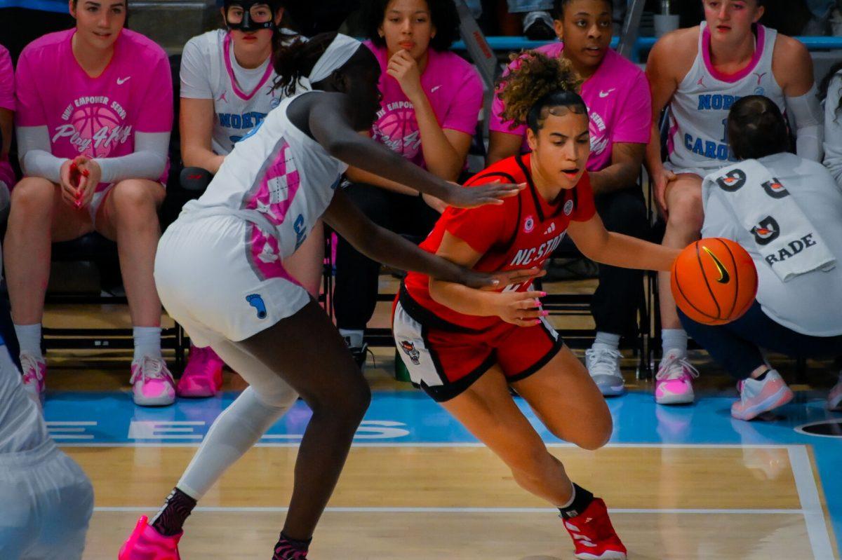 NC State guard Madison Hayes drives toward the basket during the game against UNC on Sunday, Feb. 16, 2025, in Carmichael Arena. Hayes recorded 13 points and six defensive rebounds. NC State lost to UNC 66-65.