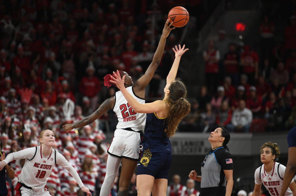 Senior guard Saniya Rivers wins the tipoff to start the second overtime period of the game against the Notre Dame Fighting Irish in Reynolds Coliseum on Sunday, Feb. 23, 2025. Rivers scored 14 points and recorded nine assists, three blocks and two steals. The Wolfpack beat the number one ranked Fighting Irish in double overtime 104-95.