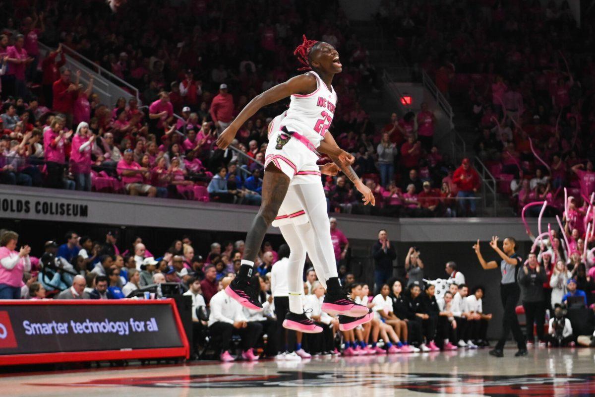 Senior guard Saniya Rivers does a celebratory jump during the Play4Kay game against Duke at Reynolds Coliseum on Monday, Feb. 3, 2025. Rivers scored 13 points for NC State. The Wolfpack beat the Blue Devils 89-83.