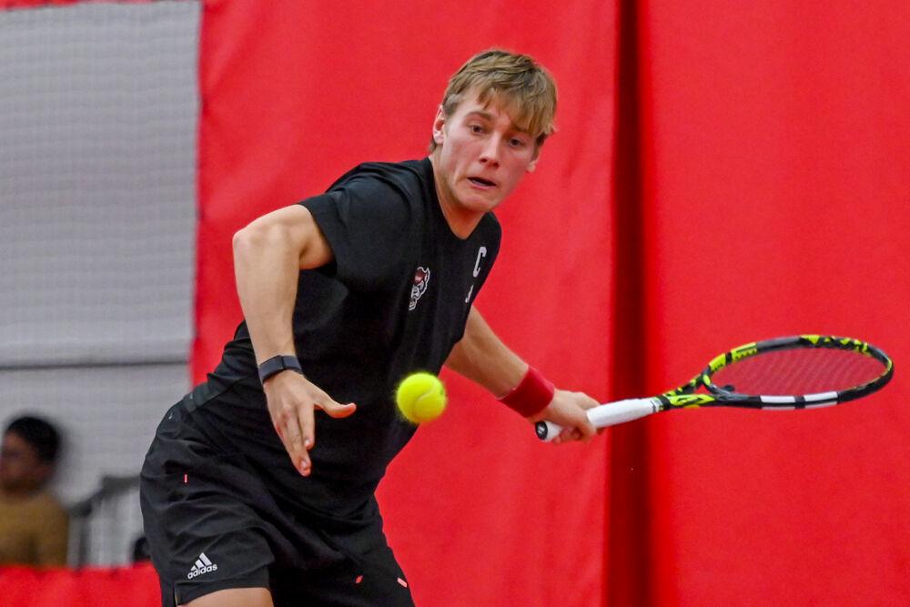 Senior Fons Van Sambeek returns the ball during his doubles game with freshman Noah Gabriel against NC Central at the J.W. Isenhour Tennis Center on Saturday, Jan. 18, 2025. Gabriel and Van Sambeek won their doubles match 6-2. NC State won the match 7-0.
