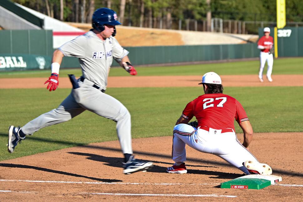 Sophomore infielder Chris McHugh tags the runner out during the game against Richmond at Doak Field at Dail Park on Tuesday, Feb. 25, 2025. The Wolfpack lost to the Spiders 5-1.