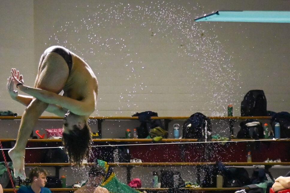 Freshman diver Noah Wanzer flips during the meet against UNC-Wilmington in the Casey Aquatic Center on Friday,&#160;Jan. 31, 2025. NC State beat UNC-Wilmington 161-114.