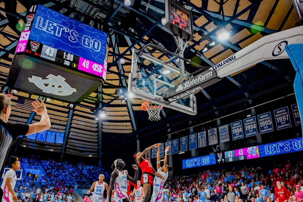 NC State guard Saniya Rivers blocks a UNC shot during the game on Sunday, Feb. 16, 2025, in Carmichael Arena. Rivers recorded four blocks in the matchup. The Tar Heels defeated the Wolfpack 66-65.
