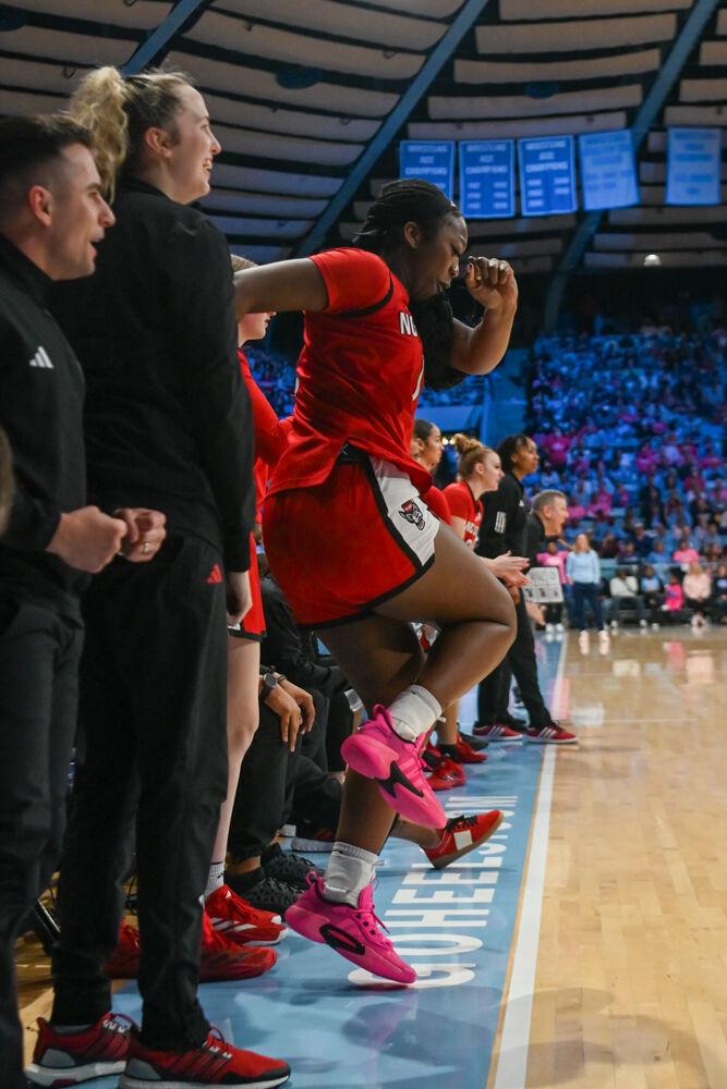Freshman center Lorena Awou stomps the ground after the team scores a point during the game against UNC-Chapel Hill in Carmicheal Arena on Sunday, Feb. 16, 2025. Awou scored three points. NC State lost to Chapel Hill 66-65.