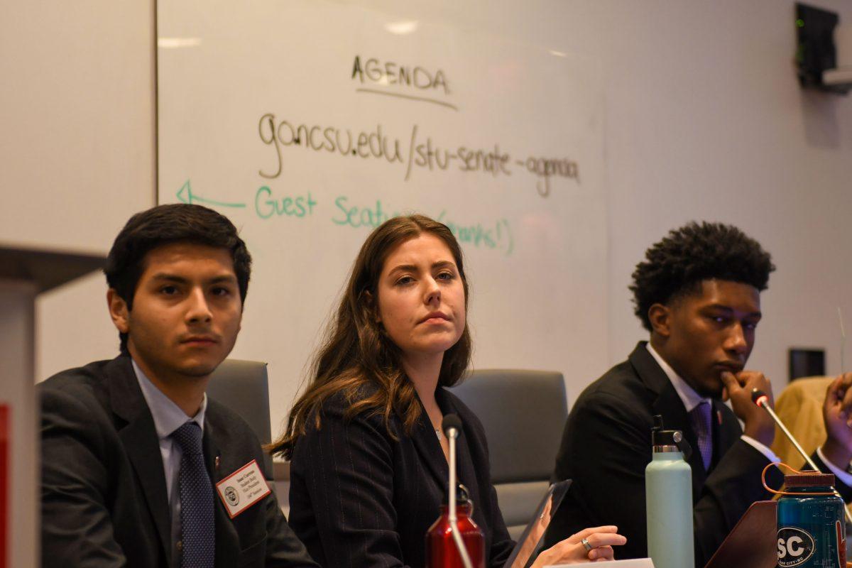 (left to right) Isaac Carreno, a third-year studying social work and political science, Allison Markert, a fourth-year studying natural sciences and Taquan Dewberry, a second-year studying computer science and philosophy, listen to resolution arguments during the student senate meeting at Talley Student Union on Wednesday, Feb. 5th, 2025. Carreno and Markert currently serve as the vice president and president of the executive branch, while Dewberry serves as the student senate president pro tempore.
