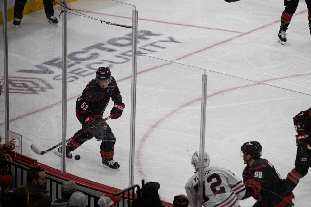 Right Wing Jackson Blake eyes the puck during the game versus the Chicago Blackhawks at the Lenovo Center on Thursday, Jan 30, 2025. Blake had one assist during the game. The Hurricanes beat the Blackhawks 3-2.