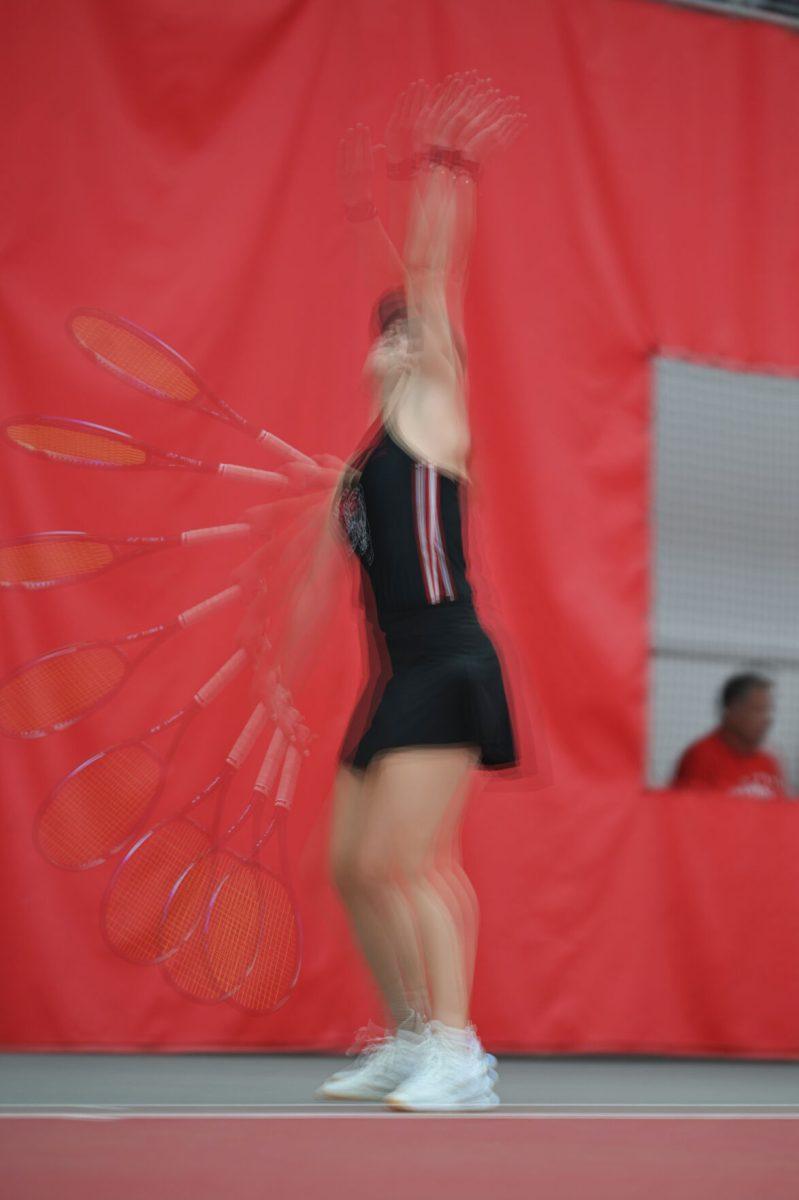 Junior Anna Zyryanova prepares to serve the ball during the match against Michigan at J.W. Isenhour Tennis Center on Friday, Feb. 14, 2025. Zyryanova lost her singles match 2-1. NC State defeated Michigan 5-2.
