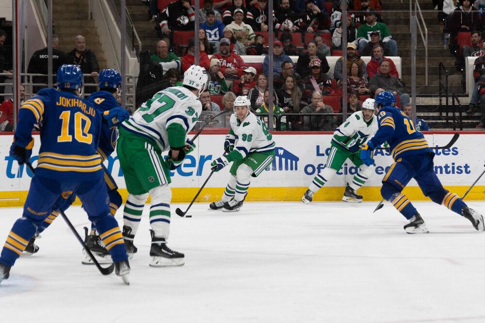 Right wing Mikko Rantanen eyes the goal during the Whalers Night game versus the Buffalo Sabres&#160;at the Lenovo Center on Thursday, Feb. 27, 2025. Rantanen scored one goal during the game. The Hurricanes beat the Sabres&#160;5-2.