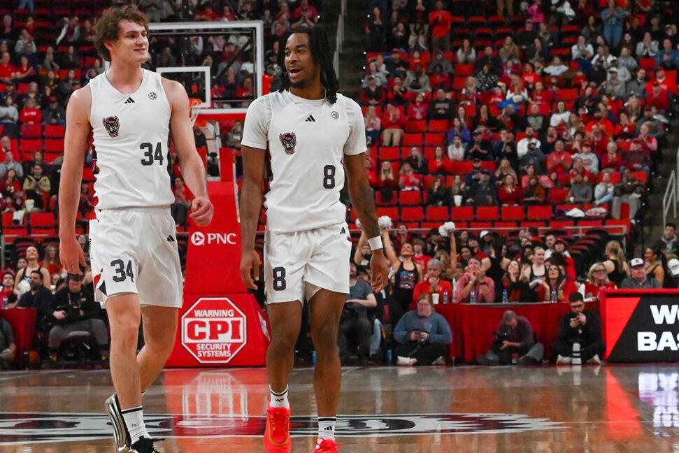 Senior forward Ben Middlebrooks and senior guard Jayden Taylor talk during the game against Boston College in the Lenovo Center on Saturday, Feb. 15, 2025. Middlebrooks and Taylor each had one assist. The Wolfpack beat the Eagles 70-62.