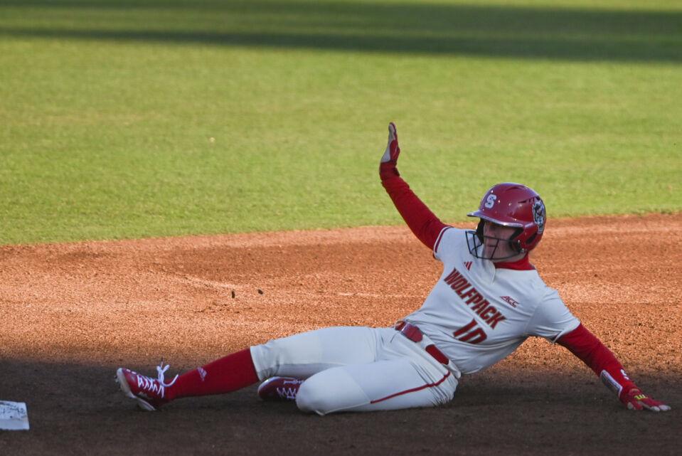 Junior outfielder Ellie Goins slides into third base during one of the Marucci Classic games against Northern Colorado&#160;at Dail Softball Stadium on Friday, Feb. 21, 2025. Goins scored one run for the team. The Wolfpack defeated the Bears 11-1.