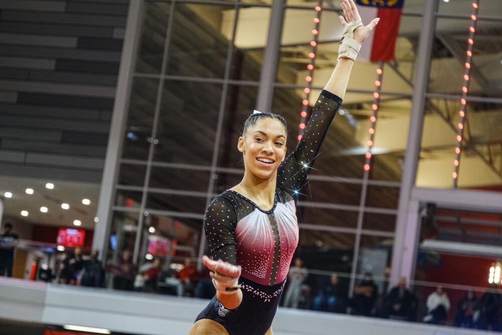 Freshman Ava Myers preforms on the floor exercise during the meet against UNC-Chapel Hill&#160;at Reynolds Coliseum on Friday, Feb. 21, 2025. Myers scored a 9.65 on the floor exercise. NC State beat UNC 197.025-195.500.