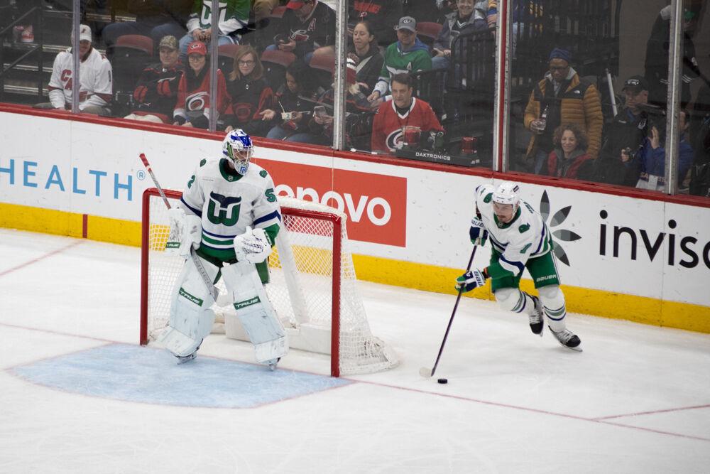 Defensemen Dmitry Orlov handles the puck during the Whalers Night game versus the Buffalo Sabres&#160;at the Lenovo Center on Thursday, Feb. 27, 2025. The Hurricanes beat the Sabres&#160;5-2.