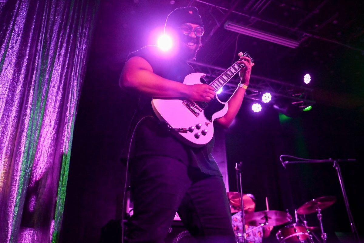 The guitarist of Memoria smiles while performing during the second night of WKNC's Double Barrel Benefit at Kings in Downtown Raleigh on Saturday, Feb. 15, 2025. This year's benefit was headlined by Boy Named Sue and My Sister Maura. Both bands originated in North Carolina.